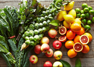 a group of fruits and vegetables on a wood surface Healthy Weight Loss Diets Sunninghill